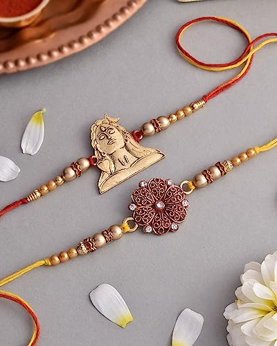 Image of Rakhi Combo For Brother Rakhi Set Of 2 Rakhi For Brother Set Of 2 Mixed Dry Fruits & Nuts Dry Fruits Combo Pack Small Pet Jars Pack Of 4 Dry Fruits Cashew Walnut Almond Adiyogi & Red Flower Set Of 2