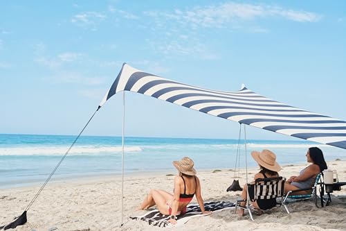 Image of Neso Grande Portable Beach Tent Sun Shelter - Lightweight Beach Shade Canopy - Easy Setup for Family Outings - Patented Reinforced Corners - UPF 50+ Sun Protection - 7ft Tall, 9 x 9ft