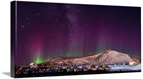 Wall Art Print Entitled A Fleet of Flatbed Trucks is Illuminated by A Fain by Celestial Images | 32 x 15