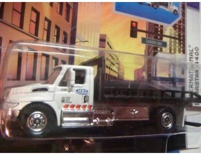 Matchbox - Camión de fundición a presión altamente detallado The Real Working Rigs International Durastar 4400 - Transportador automático de cama