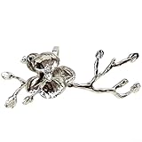 Accessoire de salle à manger sophistiqué : rehaussez votre table avec ces élégants ronds de serviette orchidée qui transforment les repas ordinaires en expériences mémorables