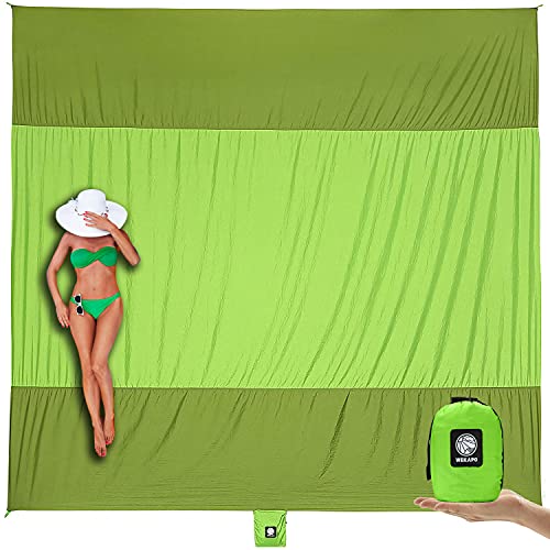 Image of WEKAPO Beach Blanket Sandproof Waterproof, Extra Large Beach Mat, Oversized & Compact Sand Free, Quick Drying Beach Essentials for Vacation, Cruise, Picnic & Camping with Stakes