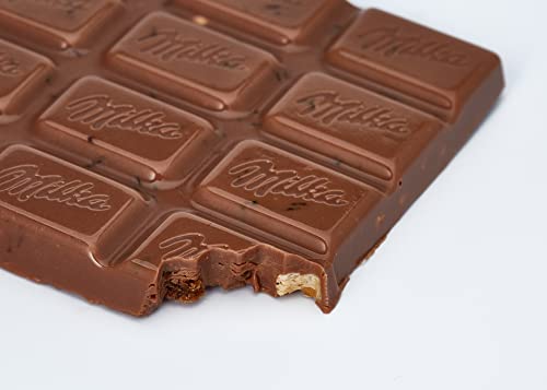 Milka Trauben-Nuss Tafel 22 x 100g, Alpenmilch Schokolade mit Trauben- und Haselnüssen, Noch schokoladiger – Bild 5