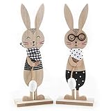 Schönes Osterhasen Pärchen bestehend aus zwei verschiedenen Osterhasen Figuren - einem Hasenmädchen und einem Hasenjungen. Farben: natur, schwarz, weiß.