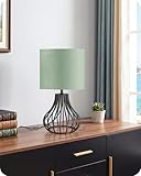 lampe iodure metallique eclairage public Base stable et durable: Sa base métallique au design fluide épouse des lignes aérodynamiques, transformant la solidité en œuvre d’art. La conception en cage, soudée avec précision, garantit une assise stable et évite les bascules accidentelles