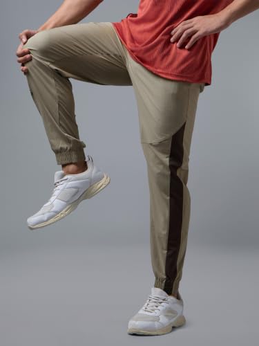 Image of TECHNOSPORT Men's Regular Fit Joggers with Zip Pockets, TECHNOLITE Quick Dry Stretchable Lightweight Track Pants for Gym Running and Casual Wear