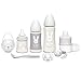 Suavinex Set Premium Regalo Recién Nacido con Biberón 150ml, Biberón 270ml y Biberón 360ml, Dosificador de leche, Chupete fisiológico desde 0 hasta 6 meses, Portachupetes, Broche y Cuchara, Color Gris