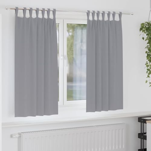 Rideaux occultants gris pour tamiser la chambre et créer une ambiance cocooning au salon