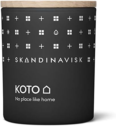 Skandinavisk ØY 'Island' Mini Scented Candle. Fragrance Notes: Crabapple and Dog Rose, Water Mosses and Green Leaves. 65 g.