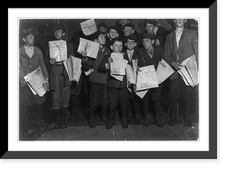 Historic Framed Print, After midnight April 17, 1912, and still selling extras. There were many of these groups of young news-boys selling very late these nights. Youngest boy in the group is Israel Spril (9 yrs. old), 314 I St., N.W., Washington D.C., 17-7/8" x 21-7/8"