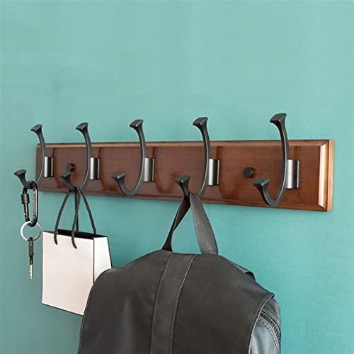Chambre à coucher chaleureuse avec une patère en bois authentique - 5
