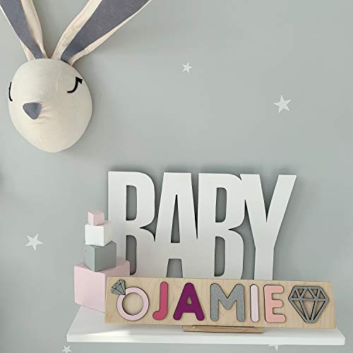 wooden name puzzle with pegs