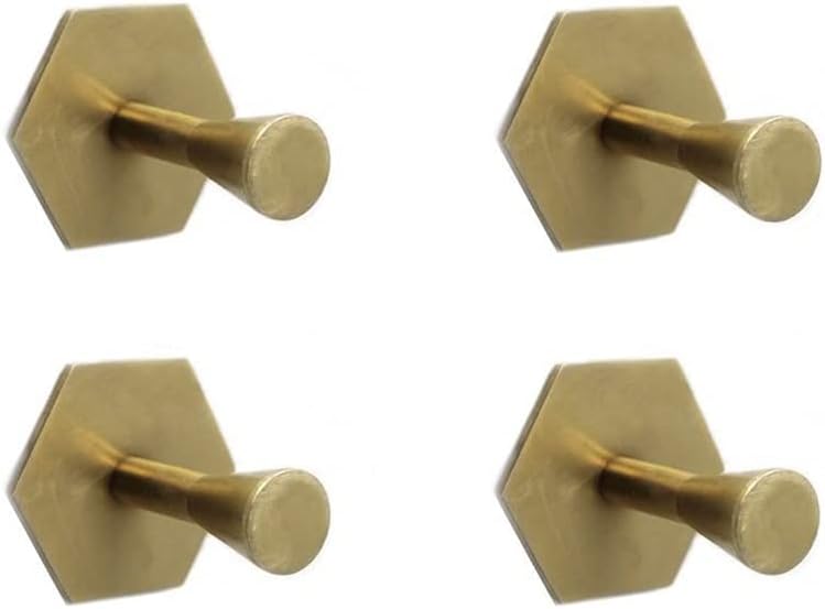 A small unlacquered antique brass adhesive robe hook