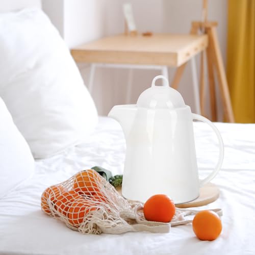 Tetera de cerámica de color con asa ergonómica para un servicio de café impecable 5