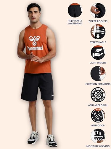 Image of hummel Move Solid Regular fit Polyester Shorts for Men with Zipper Pockets Comfortable Breathable Fabric Stretchable for Everyday Use Ideal for Yoga Training Gym Running or Performance