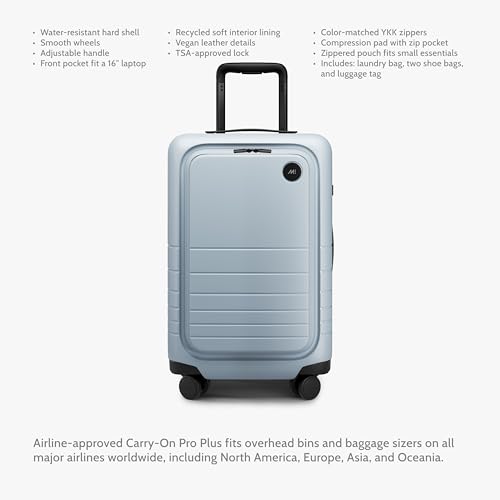 Image of Monos Carry-On Pro Plus Luggage 23 Inch - Hardside Spinner Suitcase with TSA Lock & Laptop Front Pocket | Airline Approved, 42L Polycarbonate Rolling Carry On | Fits 16 inch Laptop | Blue Haze