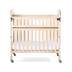Foundations serenity safereach side compact crib nonmarking commercial casters low profile solid steel frame adjustable mattress board mirrorview end panel natural wood  urban country home decor