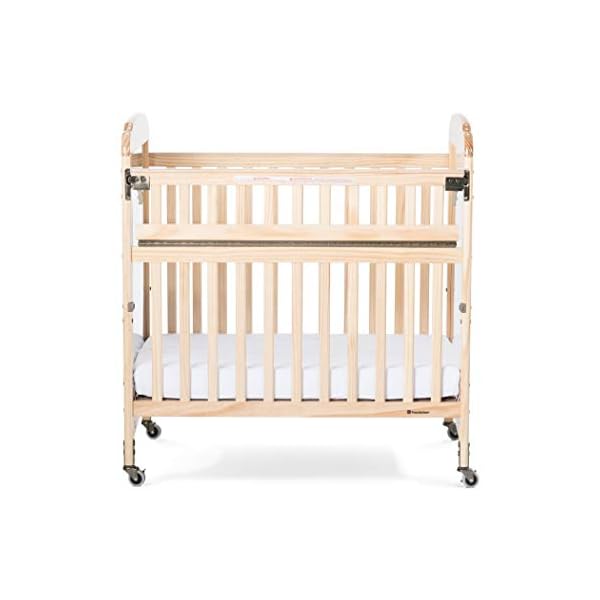 Foundations serenity safereach side compact crib nonmarking commercial casters low profile solid steel frame adjustable mattress board mirrorview end panel natural wood  urban country home decor