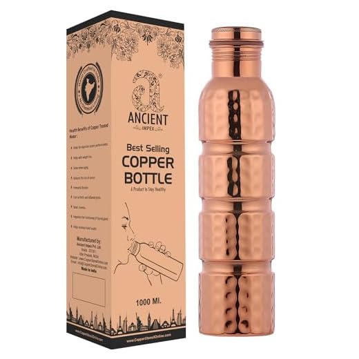 AncientImpex Botella de agua de cobre puro martillado, sin costuras, a prueba de fugas, capacidad de 1000 ml