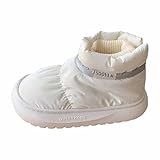 Conception antidérapante : la semelle grise présente des rainures profondes qui améliorent l'adhérence sur les surfaces glissantes comme la neige et la glace, pour une marche plus sûre.