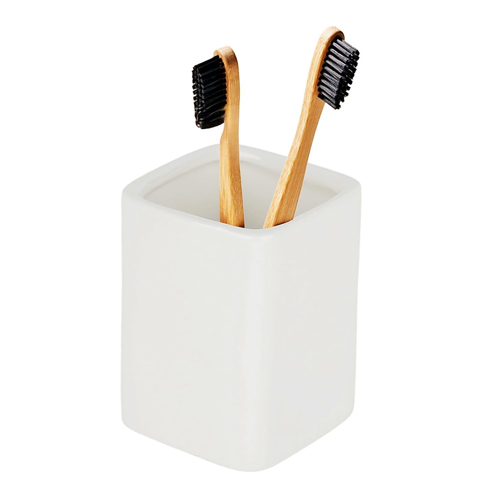 Porte-brosse à dents céramique pour optimiser l'espace du lavabo de salle de bain