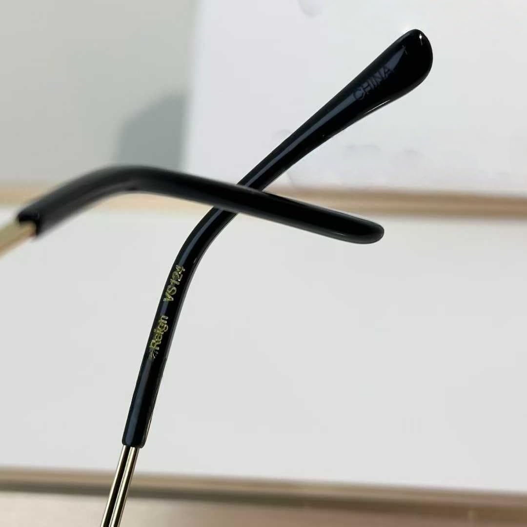 Gafas de sol con montura ovalada de metal, protección UV400, estilo retro.