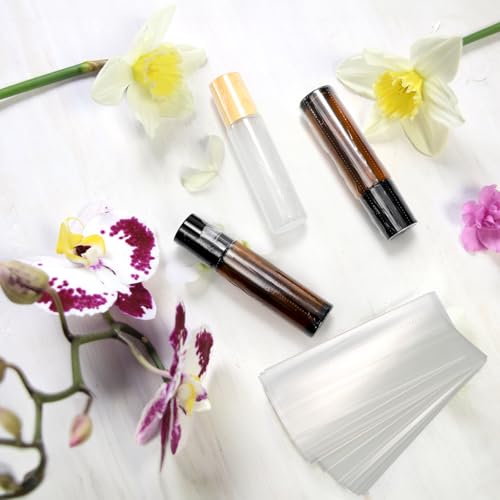 Image of TOPZEA 1000 PCS Heat Shrink Wrap Bands for 10ml Roller Bottles, Clear Perforated Shrink Wrap Bands Sleeves for Lip Balm Tubes, Lip Gloss, Perfume Sample, Essential Oil Bottle, Easy to Use, 3.3 inchx 1.3 inch