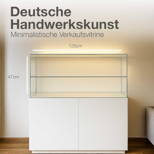 Sichere Verkaufstheke mit Schiebetür und Schloss für wertvolle Exponate.