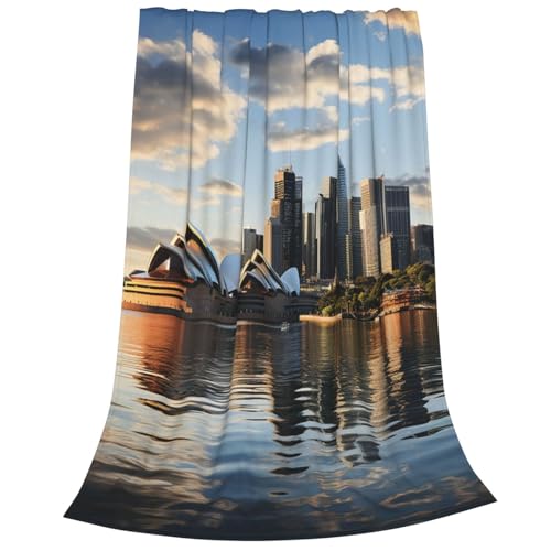 Couverture canapé microfibre douce Sydney : dites adieu aux plaids lourds