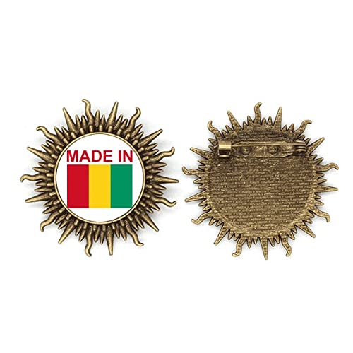 Broche en métal motif sonne Guinea Country avec haken d'attache