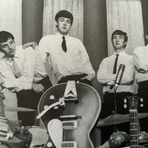 1.32.- George Mart&iacute;n, Ringo Starr y trajes de cabaret.