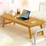 Artisanat exquis : découvrez l'artisanat exceptionnel de notre table basse, habilement fabriquée à partir de bambou respectueux de l'environnement. Son design assure une utilisation durable, tandis que les propriétés de refroidissement naturelles du bambou le rendent parfait pour placer votre ordinateur portable. Améliorez votre espace de vie avec une pièce élégante et fonctionnelle qui complète tout décor.