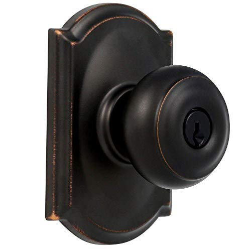 Image of Schlage F51A GEO 716 CAM Georgian Door Knob with Camelot Trim, Keyed Entry Lock, Aged Bronze
