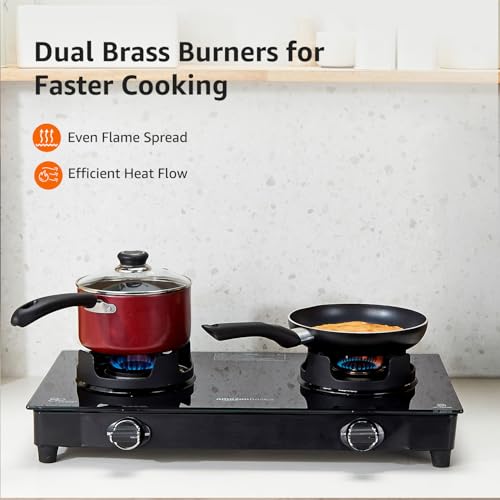 Image of Amazon Basics 2 Burner Glass Top Gas Stove - Auto Ignition, 5G Brass Burners, Crown Pan Supports, ISI Approved, Toughed Glass Top, Anti Skid Legs - Black