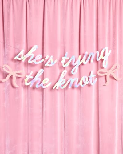 Image of xo, Fetti She's Tying the Knot Banner - Iridescent Foil | 4.5 Ft. | Bow Bachelorette Decorations, Engagement Party Sign, Proposal Background, Bach Supplies