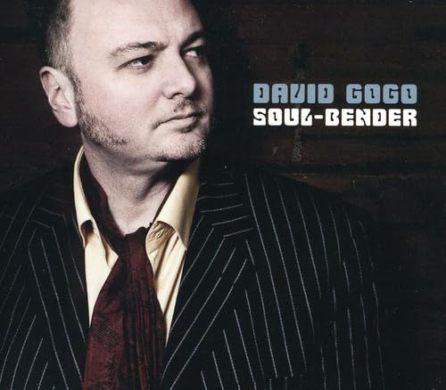Soul Bender [Audio CD] David Gogo; John Densmore; E. James; M. Jackson; Ray Manzarek; Robin Trower; Robby Krieger; Rick Hopkins; Shelley Beeston; Charlie Quintana; Tina Jones; Lincoln Gogo; Bill Hicks; Southside Steve Marriner; Pat Steward; Jona Kristinsson; Pierre Komen; Doug Elliot; James Mark; Jay Stevens; Michael Burke and Rick Salt