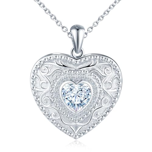 Foto Collana Progettazione:La collana pendente cuore è decorata con un cuore scintillante, che rende la collana ancora più squisita e costosa, ed è facile distinguersi dalla folla quando lo indossa. Apri la cerniera del medaglione di cristallo, puoi anche tagliare una foto particolarmente importante e memorabile e metterlo nel ciondolo amore per registrare i bei momenti della tua vita.