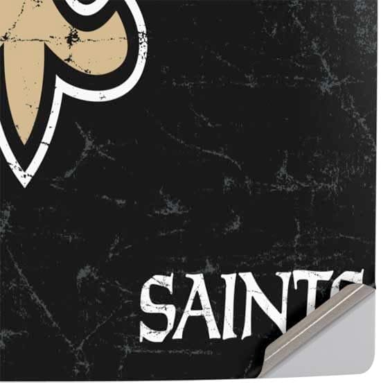 Skinit Decal Gaming Skin Compatible with PS5 Pro Console - Officially Licensed NFL New Orleans Saints Distressed Design