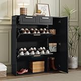 RANGEMENT POLYVALENT : l'armoire à chaussures noir est équipée de deux petits tiroirs pour ranger les clés, le cirage et autres petits objets. Elle comprend plusieurs compartiments spacieux et des étagères ouvertes pratiques pouvant accueillir environ 10 à 15 paires de chaussures de différentes tailles et types.