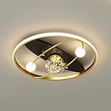 1. Comment ne pas succomber à ce magnifique plafonnier design ? Ses courbes douces, dorées et lumineuses apportent chaleur, chic et convivialité.