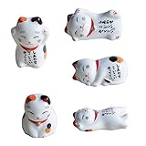 Glückliche Katze Essstäbchenablagen besteht aus Keramik und verhindert, dass die Stäbchen weg rollen. Zudem bietet die Ablage einen Platz, auf der Sie die Stäbchen ablegen können und wo diese nach der Verwendung nicht dreckig werden. Das Set beinhaltet 5 Glückliche Katze in verschiedenen Positionen.