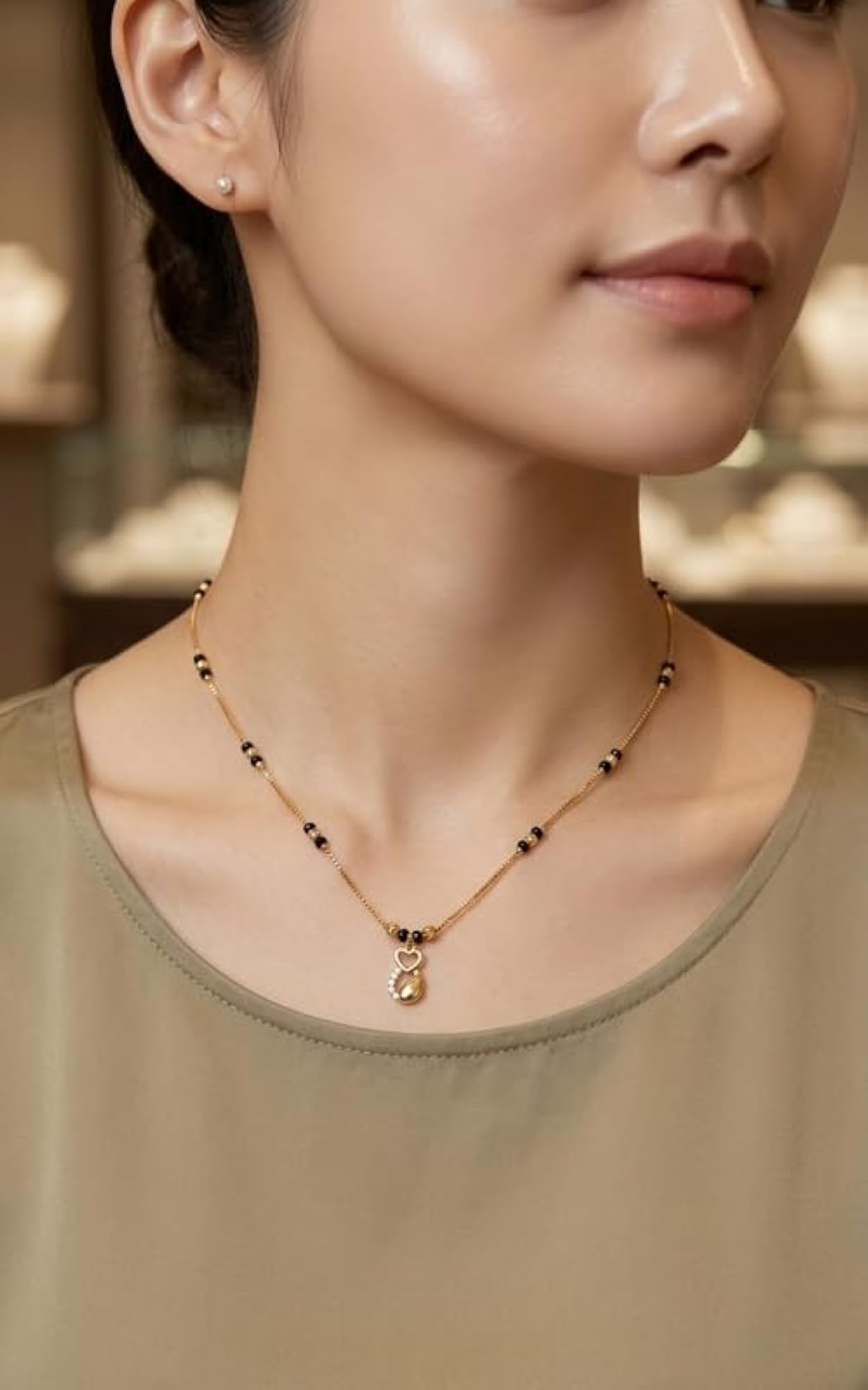 Women's Elegant Gold Heart Mangalsutra with Black Beads