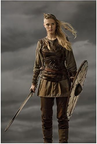 Vikings Gaia Weiss as Porunn Holding Shield and Sword Under Dark Skies 8 x 10 Photo