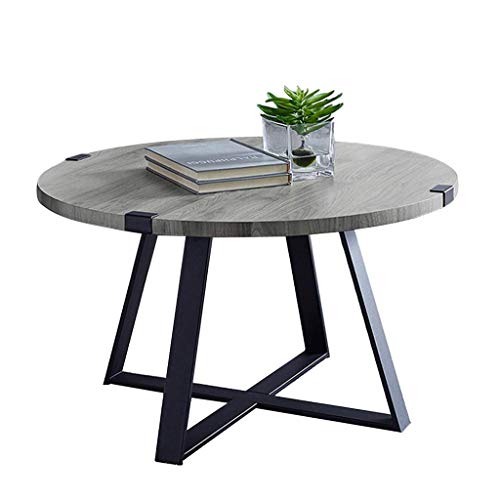 Table basse ronde en bois gain de place pour optimiser les petits salons