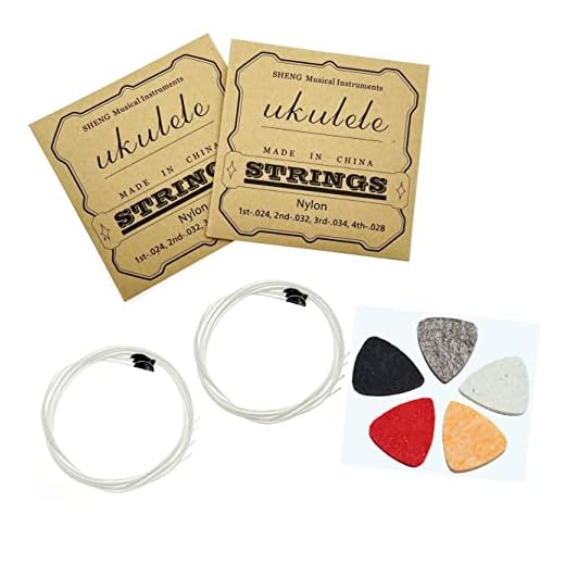 JZK Juego de 2 cuerdas de nailon blanco para ukelele con púas de fieltro, A - 1, E - 2, C - 3, G - 4, 4 cuerdas por juego, accesorios para ukelele de concierto/soprano/tenor