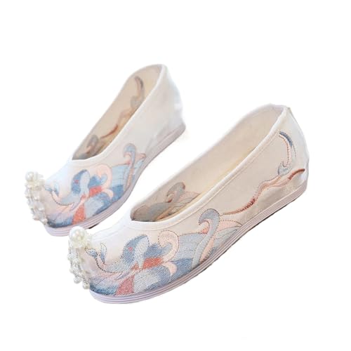 Chaussures compensées brodées femme en blanc élégant et finitions traditionnelles