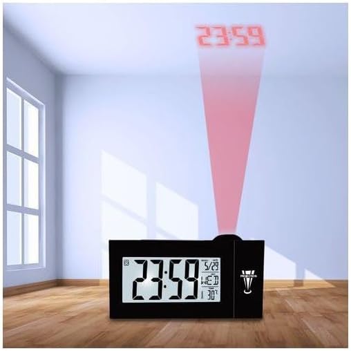 The DS-3605 clock on a wooden floor in a room, projecting the time 23:59 onto the white wall.
