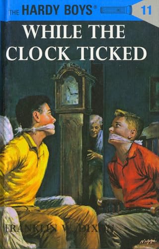 While the Clock Ticked (Hardy Boys, Book 11) 0448089114 Book Cover