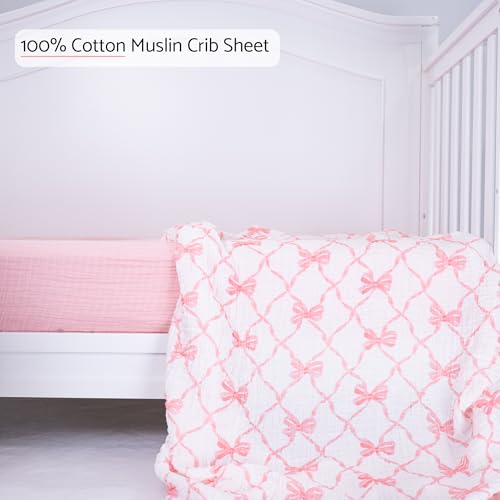 Image of LollyBanks Muslin Crib Sheet, 100% Cotton Fitted Crib Sheets for Girls | 2 Pack, Soft airy weave, flexible elastic hem on 52 x 28 in standard mattresses (Pink Bow and Solid Pink)