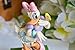 Enesco Disney Traditions Collection by Jim Shore Daisy Duck with Flowers and Butterflies Figurine- Stone Resin Hand Painted Collectible Disney Figurines Home Decor Statue, 5 Inch